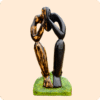 A Carved Sculpture Of A Thinking Man