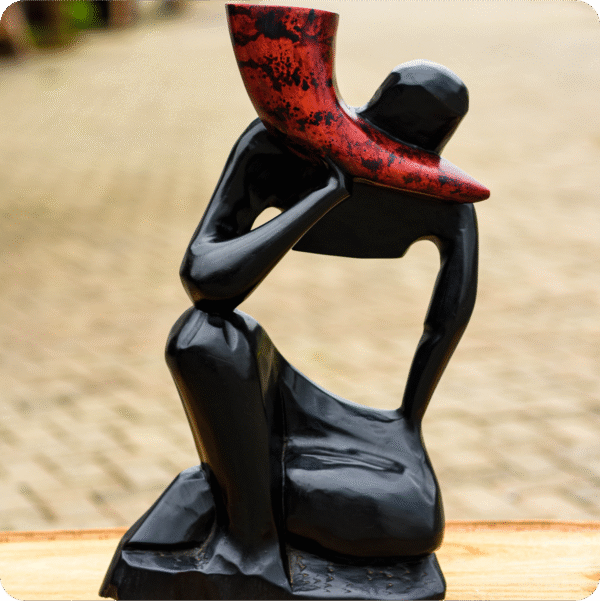 A Horn Blower Carved Scuplture Main