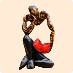 Carved Sculpture Of A Thinking Man With Book